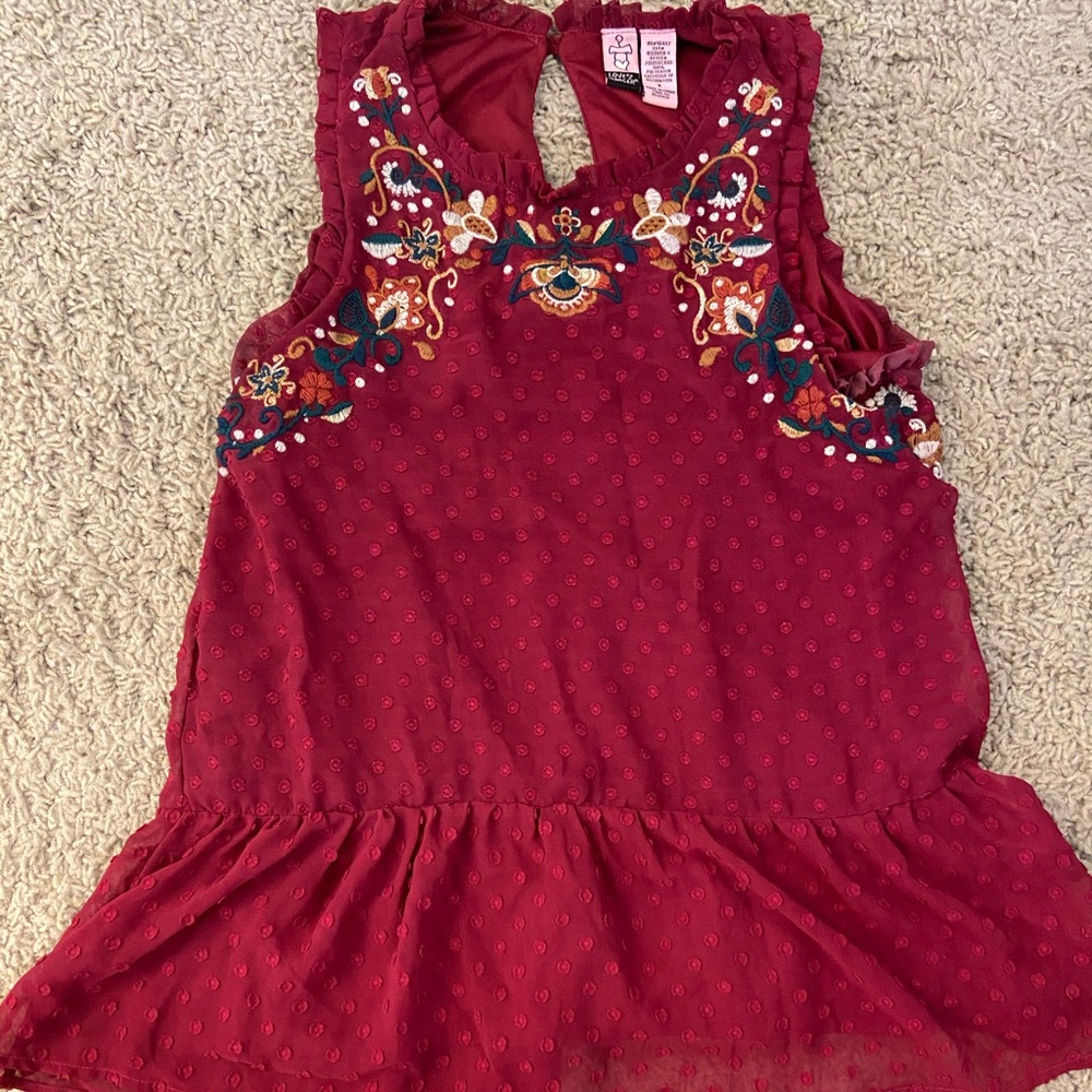 Burgundy peplum embroidered with flowers top